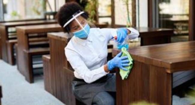 Professional disinfecting of shared seating surfaces