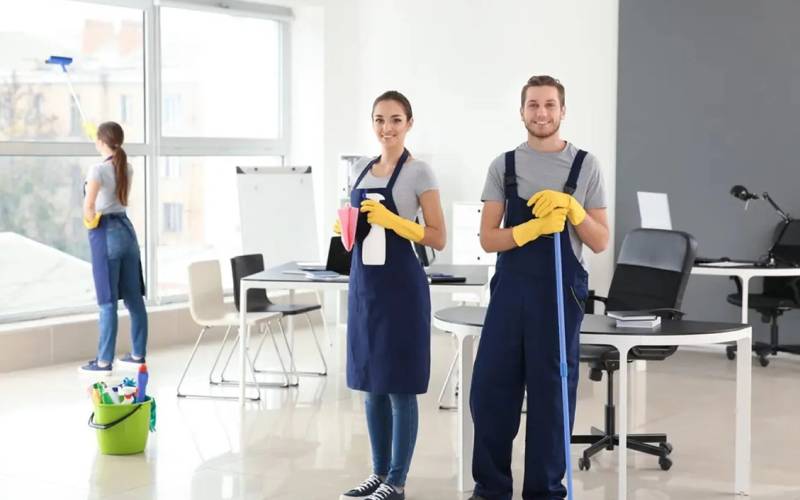 Professional cleaners maintaining a commercial property