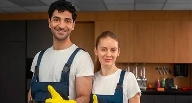 Professional office cleaning crew ready for deep cleaning services