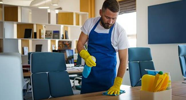 Professional cleaners maintaining a festive workplace