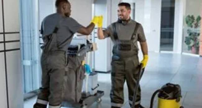 Professional post-construction cleaning team after a completed project