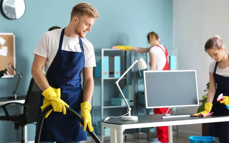 Professional office cleaning team maintaining a clean workplace